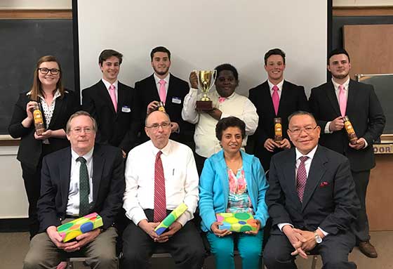 Following this year’s business plan and product prototype competition at SUNY Potsdam, the judging panel posed for a photo with the winners