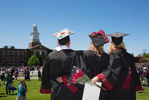 Photo from left, Joshua Overrocker ’17, Anneliese Bishop ’17 and Jacqueline Herb ’17 look out over the Academic Quad before last year’s Commencement at SUNY Potsdam.