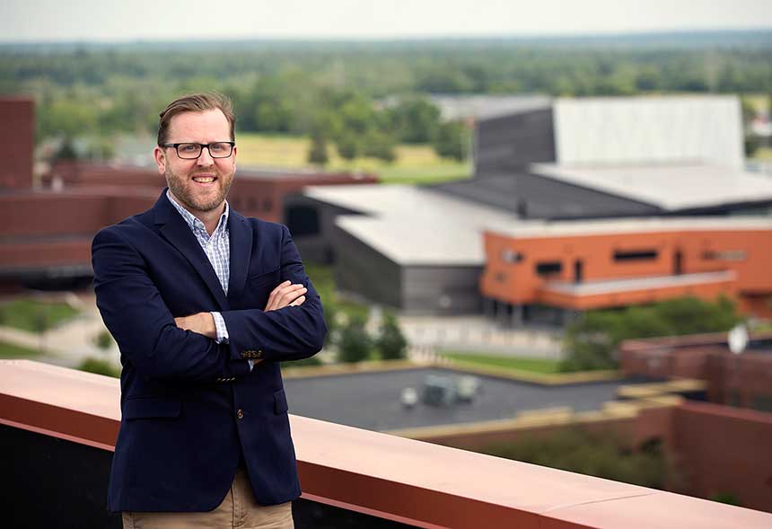 Photo of Jason Dominie overlooking the Performing Arts Center