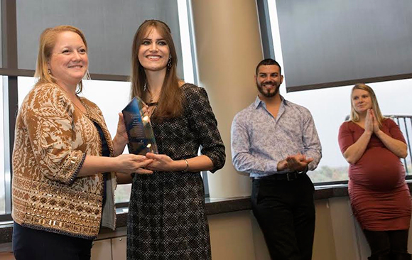 photo of student receiving Community Champion Award