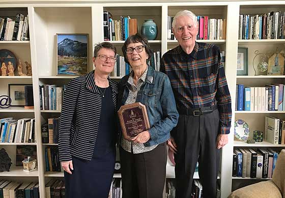 Photo of President Esterberg with Joy Dorf '58 and her husband, Richard, at their home in California