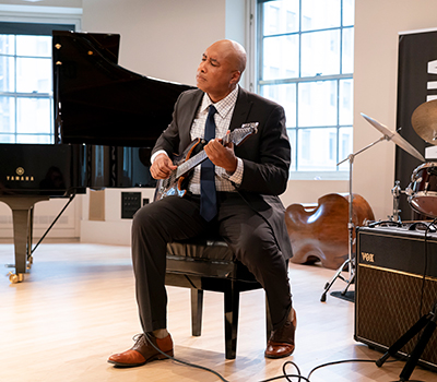 Bernie Williams performing on guitar