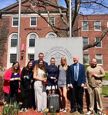 Members of the winning team in this semester’s Business Plan and Prototype Competition at SUNY Potsdam posed outside Satterlee Hall following their winning presentation. 