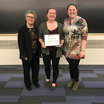 From left, Faculty Senate Chair Kim Bouchard with 2019 Faculty Award recipient Camille Holmes and Dr. Sarah Sirsat. Sirsat is the student's research mentor.