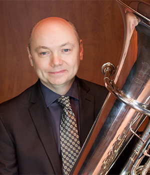 Dr. Charles Guy, a professor of tuba at The Crane School of Music