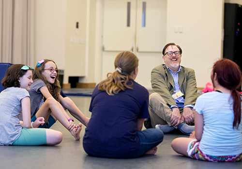 Jay Pecora and young children at Creative Arts Camp