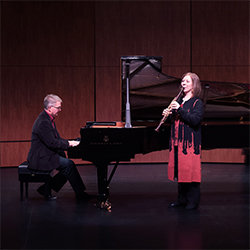 Julianne Kirk Doyle and Michael Sitton performing