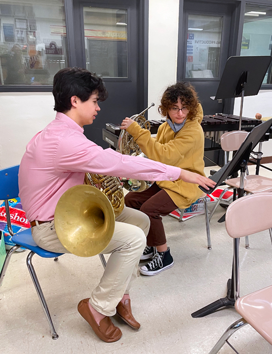 crane students working with prospective students